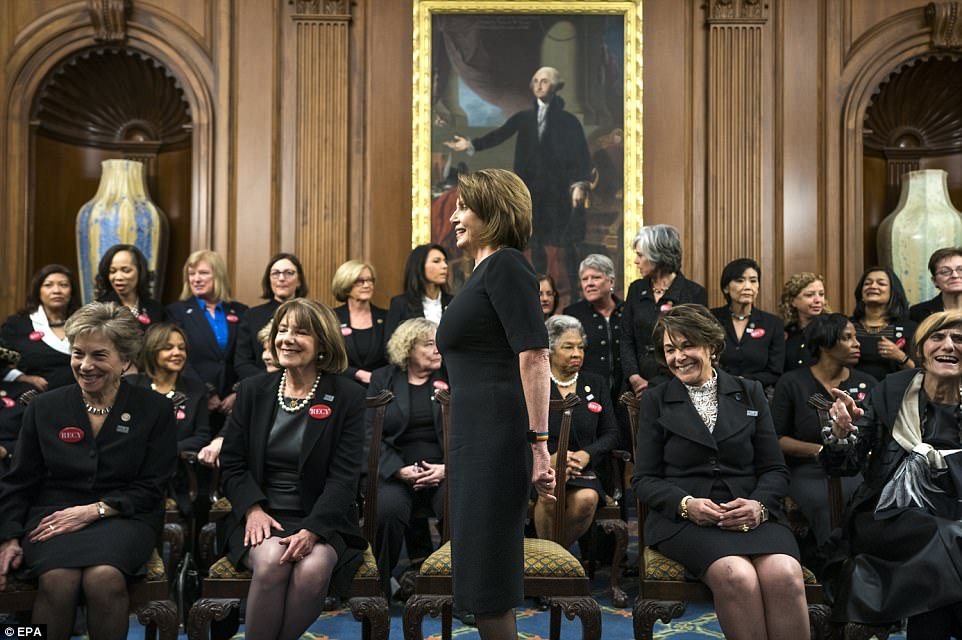 48BCC39B00000578-5333005-House_Minority_Leader_Nancy_Pelosi_stands_up_among_her_peers_as_-a-7_1517393860286.jpg