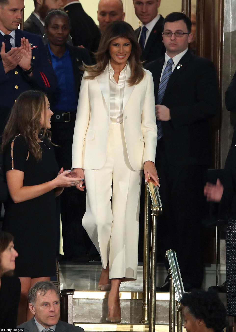 48BFD8ED00000578-5333005-Fashion_focused_The_47_year_old_wore_a_custom_made_Dior_suit_ove-a-5_1517393860210.jpg
